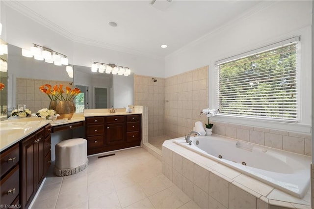 bathroom with a tile shower, a jetted tub, ornamental molding, tile patterned flooring, and two vanities