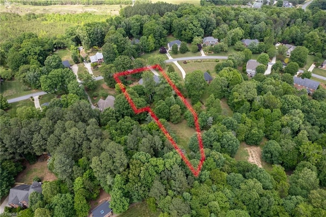 aerial overview of property's location with property parcel outlined