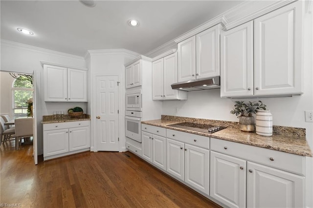kitchen featuring under cabinet range hood, white appliances, white cabinetry, dark wood-type flooring, and ornamental molding
