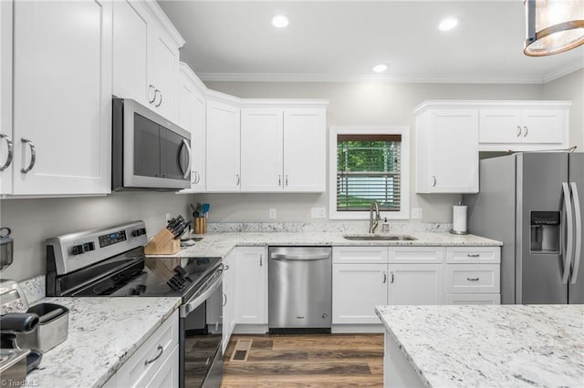 385 Apache Dr, Winston-Salem, NC 27107 - kitchen featuring stainless steel appliances, a sink, ornamental molding, white cabinetry, and recessed lighting