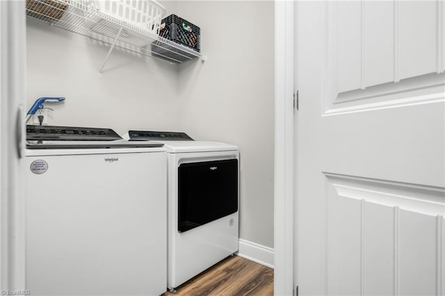 385 Apache Dr, Winston-Salem, NC 27107 - laundry area with washing machine and clothes dryer, dark wood-style floors, and baseboards