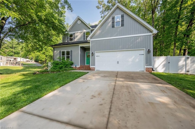 385 Apache Dr, Winston-Salem, NC 27107 - traditional-style house featuring a gate and concrete driveway