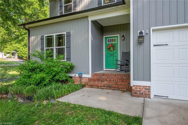 385 Apache Dr, Winston-Salem, NC 27107 - property entrance featuring a garage