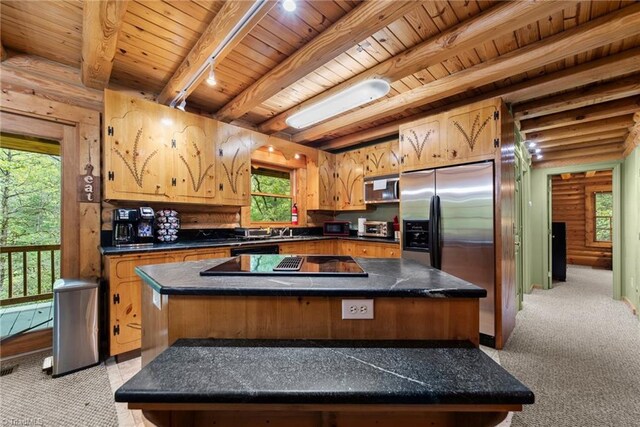 kitchen with a kitchen island, wood ceiling, beamed ceiling, light colored carpet, and appliances with stainless steel finishes