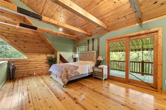 bedroom with light hardwood / wood-style floors, wooden ceiling, multiple windows, and access to exterior