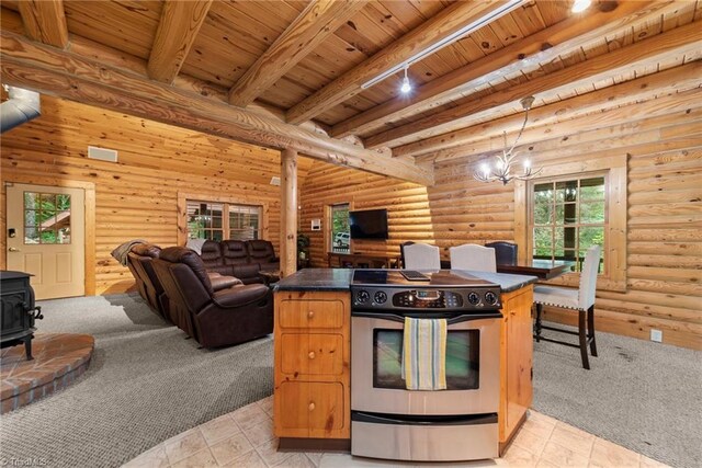 kitchen featuring wood ceiling, stainless steel range with electric stovetop, a wood stove, beamed ceiling, and an inviting chandelier