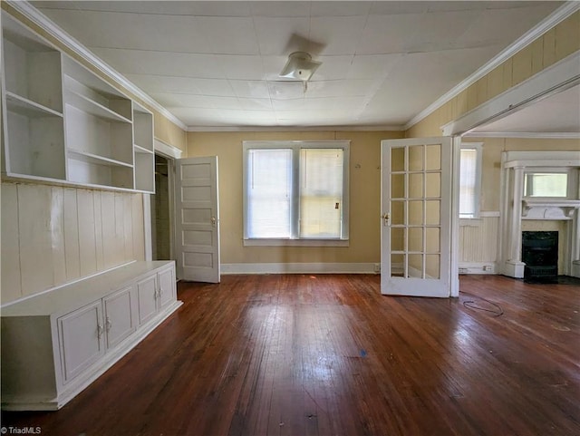 423 Tate St, High Point, NC 27260 - unfurnished living room featuring dark wood-style flooring, a fireplace, and crown molding