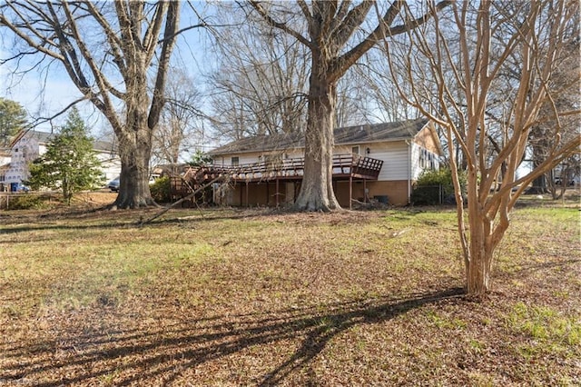 view of yard featuring a wooden deck