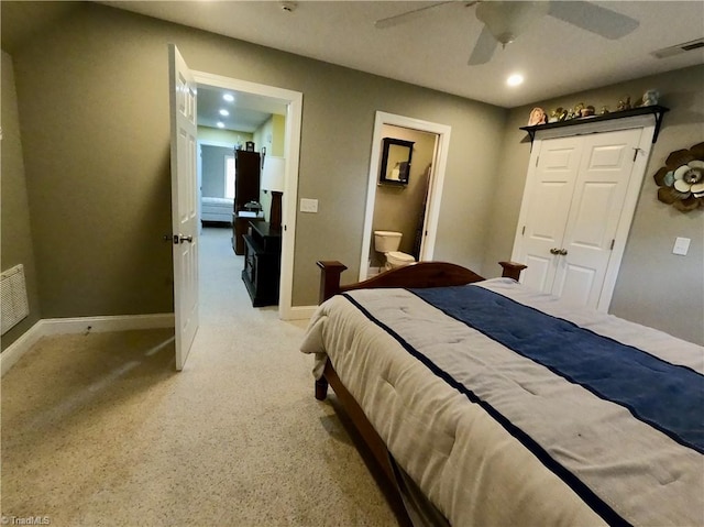 carpeted bedroom with baseboards, ensuite bath, a ceiling fan, and recessed lighting