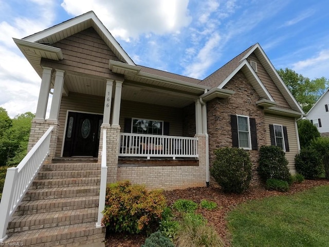 craftsman inspired home featuring a porch