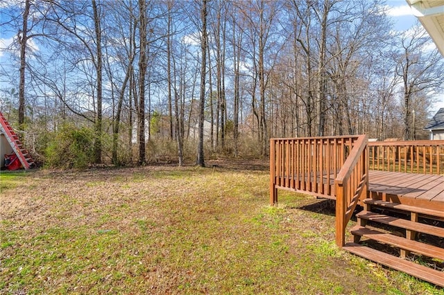 view of yard with a deck