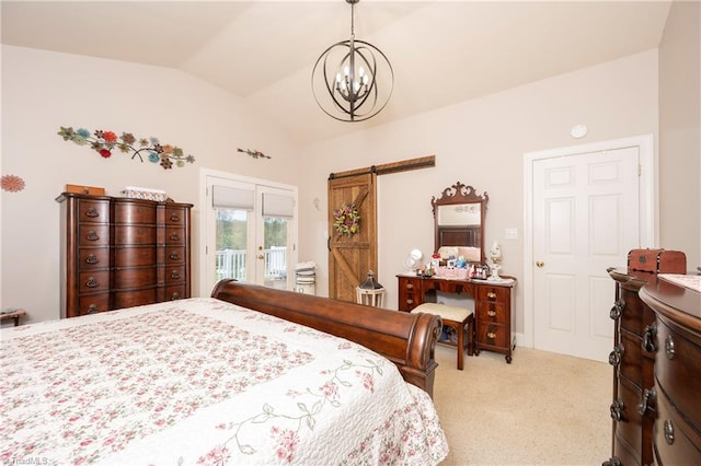 carpeted bedroom featuring access to outside, a notable chandelier, a barn door, and vaulted ceiling