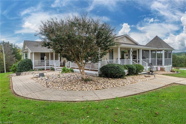 view of front facade with a porch and a front lawn