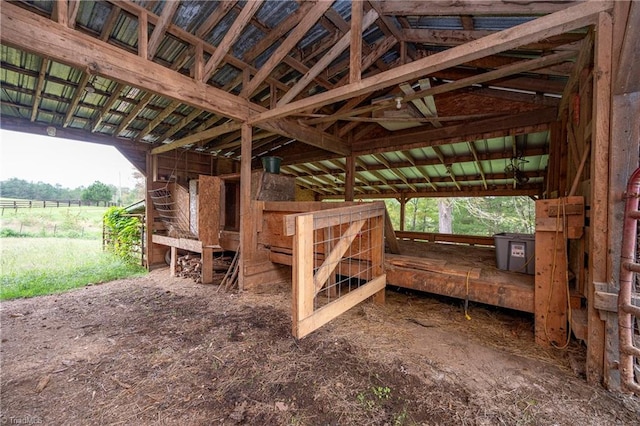 view of stable featuring a rural view