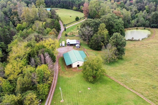 bird's eye view featuring a rural view and a water view