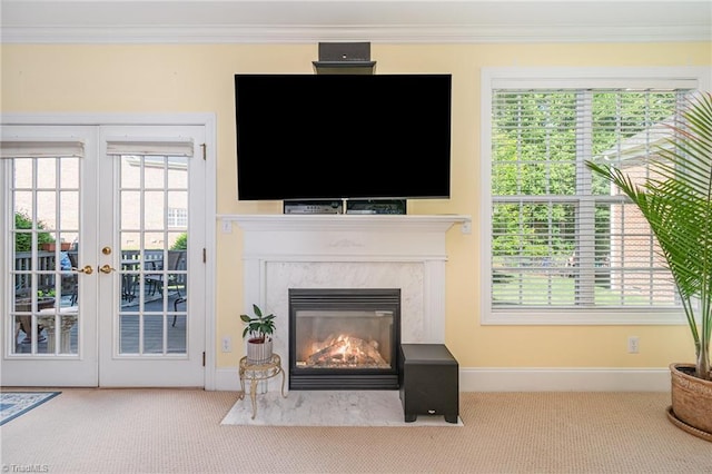 221 Oakmont Park Ct, Kernersville, NC 27284 - living area featuring carpet, crown molding, french doors, baseboards, and a fireplace
