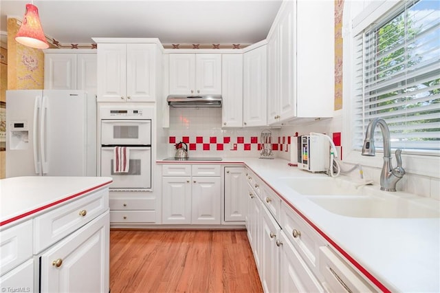 221 Oakmont Park Ct, Kernersville, NC 27284 - kitchen featuring white appliances, a sink, white cabinetry, and light countertops
