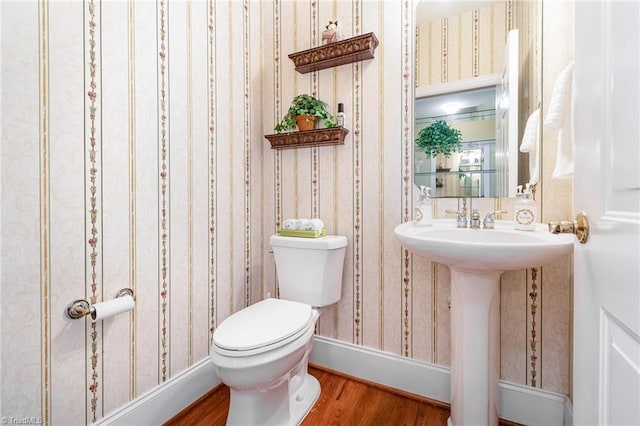 221 Oakmont Park Ct, Kernersville, NC 27284 - bathroom featuring wood finished floors, wallpapered walls, and toilet