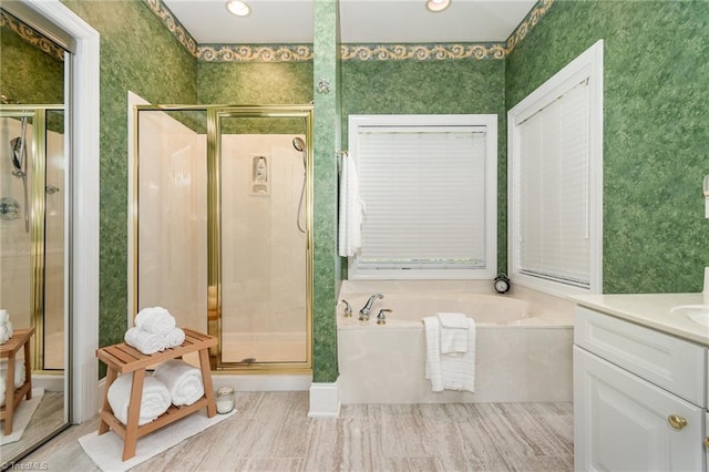 221 Oakmont Park Ct, Kernersville, NC 27284 - full bath with a shower stall, a garden tub, vanity, and wallpapered walls
