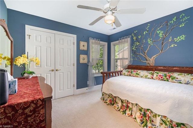 221 Oakmont Park Ct, Kernersville, NC 27284 - carpeted bedroom featuring a closet, a ceiling fan, and baseboards
