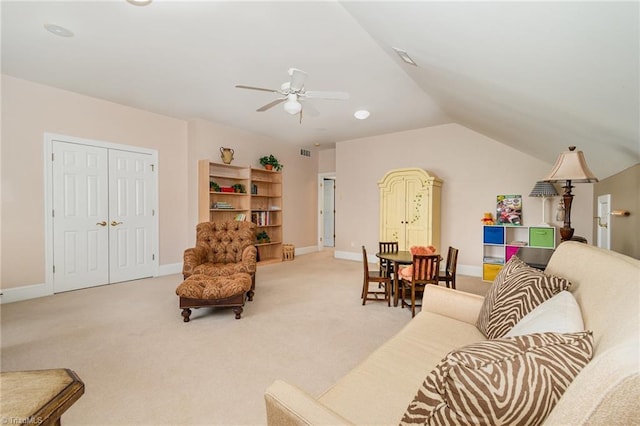 221 Oakmont Park Ct, Kernersville, NC 27284 - living area with a ceiling fan, vaulted ceiling, light carpet, and baseboards