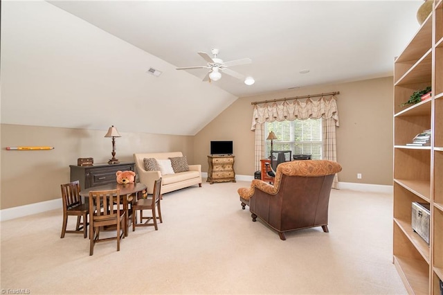 221 Oakmont Park Ct, Kernersville, NC 27284 - living room with a ceiling fan, baseboards, vaulted ceiling, and carpet flooring