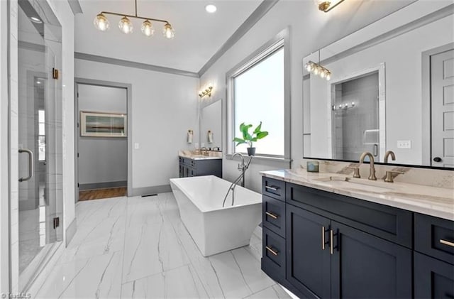 bathroom featuring crown molding, vanity, and plus walk in shower