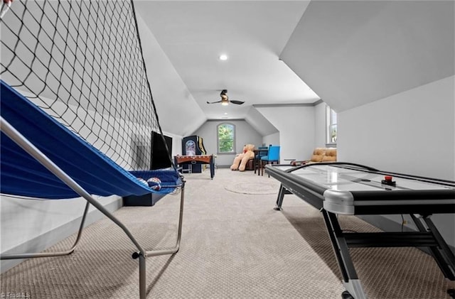 rec room with vaulted ceiling and carpet flooring