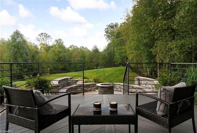 deck featuring a fire pit