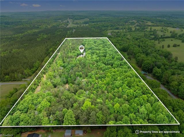 drone / aerial view with a forest view