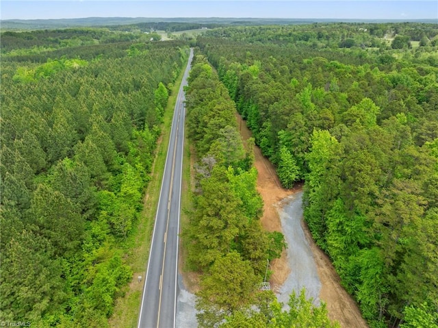 drone / aerial view with a view of trees