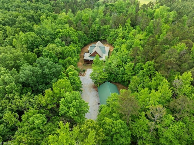 drone / aerial view featuring a view of trees