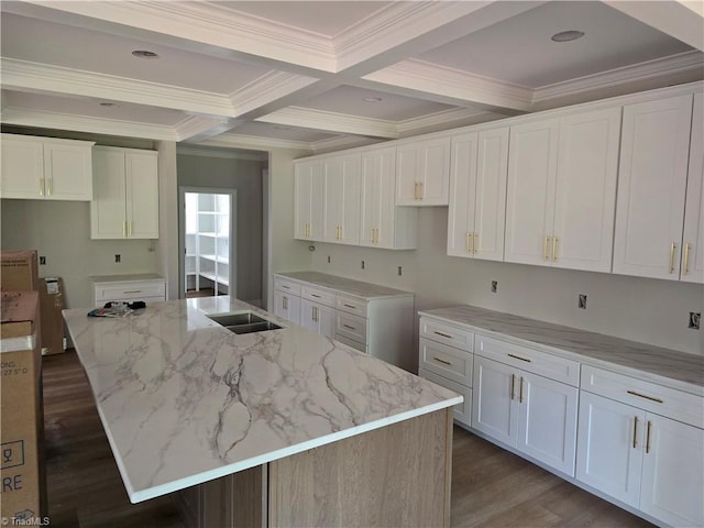 3501 Wesley Point Dr, Browns Summit, NC 27214 - kitchen featuring beam ceiling, crown molding, dark wood-style floors, light stone countertops, and white cabinetry