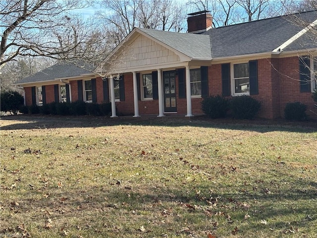 single story home with a front yard