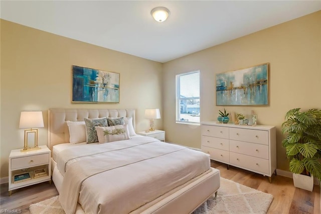 bedroom with light hardwood / wood-style flooring