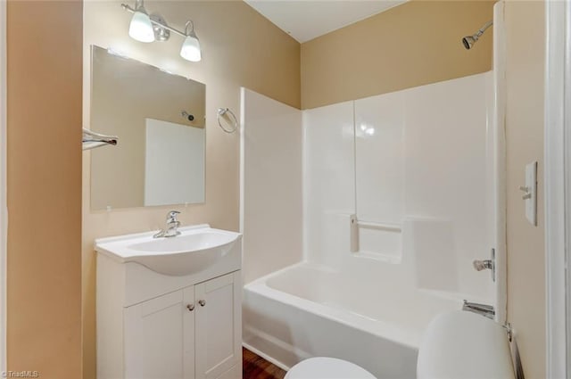 full bathroom featuring vanity, toilet, and bathing tub / shower combination