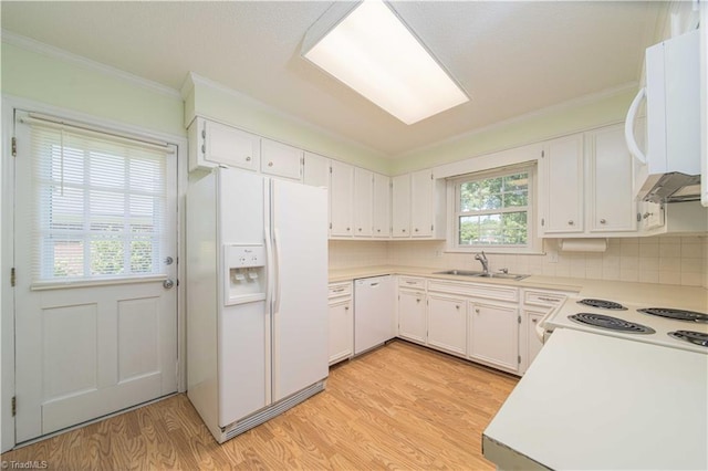 640 Summerest Ct, Kernersville, NC 27284 - kitchen with white appliances, ornamental molding, light wood-style flooring, tasteful backsplash, and light countertops