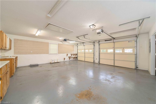 640 Summerest Ct, Kernersville, NC 27284 - garage featuring a garage door opener