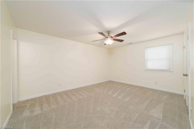 640 Summerest Ct, Kernersville, NC 27284 - empty room with a ceiling fan, light carpet, and a textured ceiling