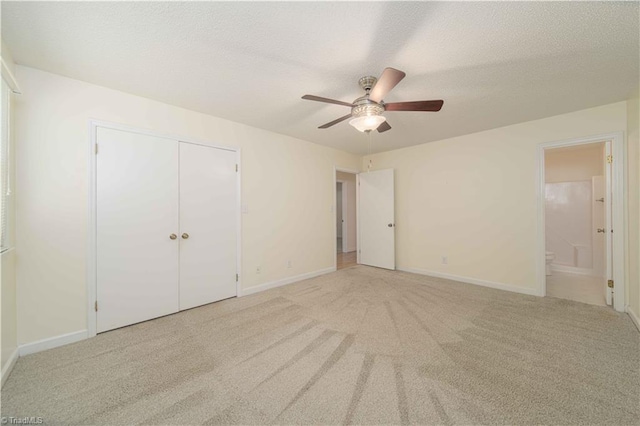 640 Summerest Ct, Kernersville, NC 27284 - unfurnished bedroom featuring carpet flooring, connected bathroom, a closet, and ceiling fan