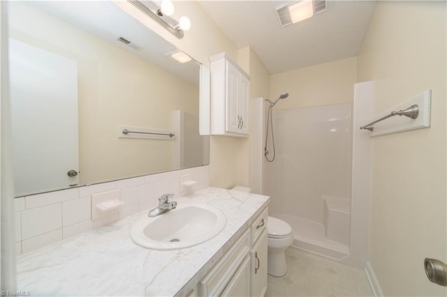 640 Summerest Ct, Kernersville, NC 27284 - full bath with vanity, a shower, tile patterned floors, and decorative backsplash