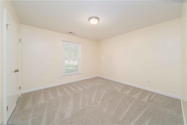 640 Summerest Ct, Kernersville, NC 27284 - unfurnished room featuring light carpet and a textured ceiling