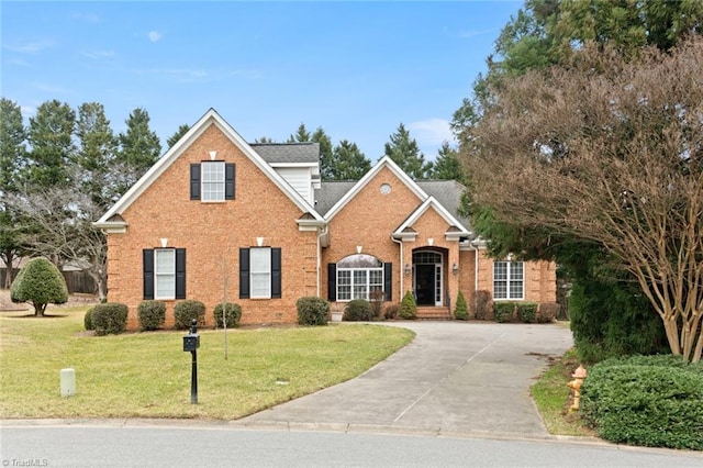 view of property with a front lawn