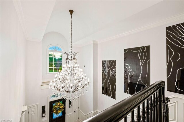 detailed view of a chandelier and ornamental molding