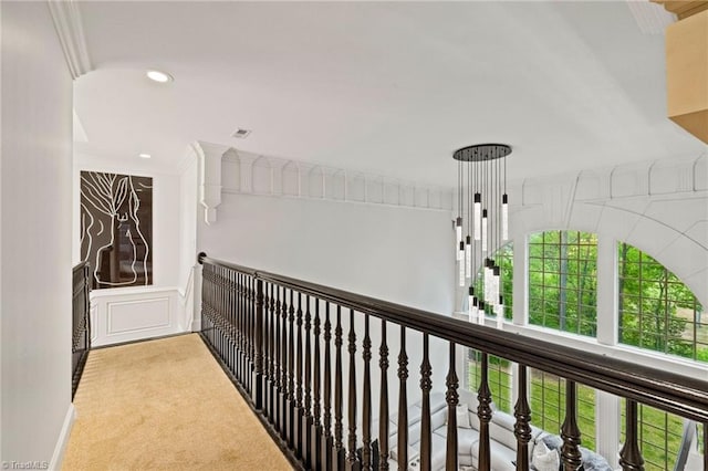 corridor with carpet, recessed lighting, and ornamental molding