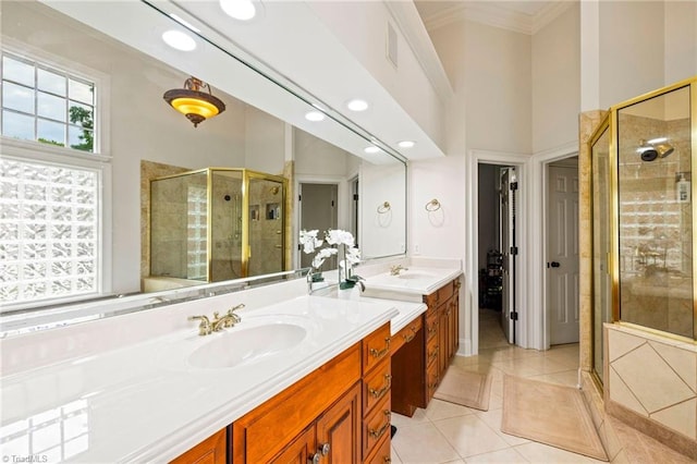 full bath with a shower stall, tile patterned flooring, crown molding, vanity, and recessed lighting