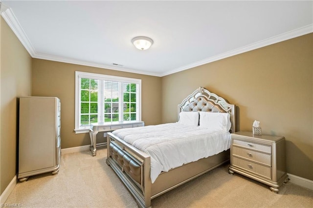 bedroom featuring ornamental molding, light carpet, and baseboards