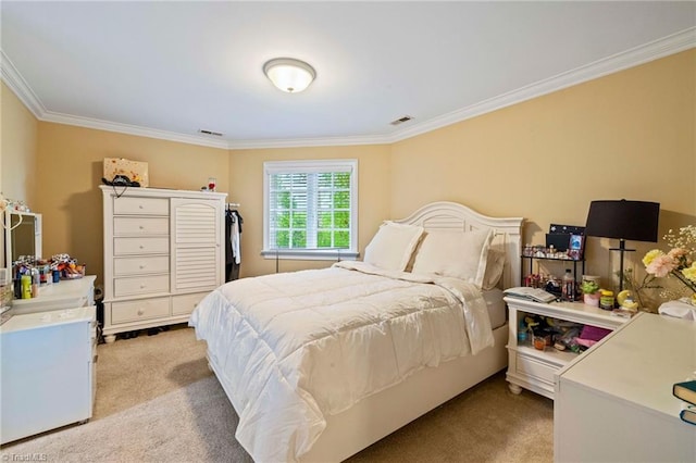 bedroom featuring light carpet and crown molding