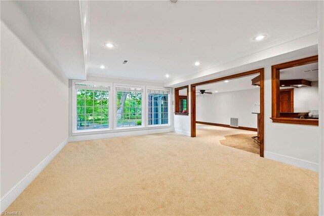 unfurnished living room with carpet floors, recessed lighting, baseboards, and ceiling fan