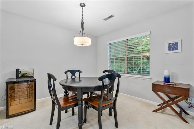 view of carpeted dining room